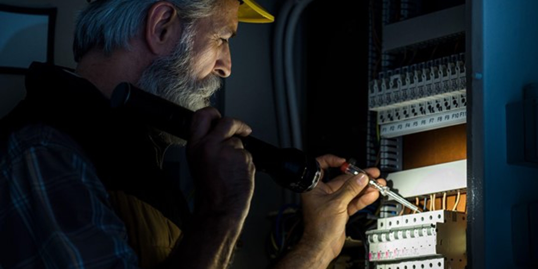 electrician working on system